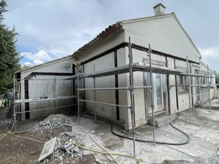 Dégagement et reprise des fondations, chantier 1, réalisation antérieure du dirigeant