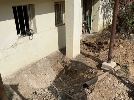 Dégagement et reprise des fondations, chantier 11, réalisation antérieure du dirigeant