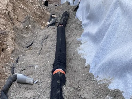 Chaînages, drainage et finitions, chantier 21, réalisation antérieure du dirigeant